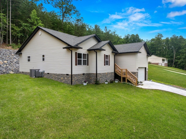 1523 Eads Bluff Rd NW, Georgetown, TN 37336 - view of property exterior featuring crawl space, roof with shingles, concrete driveway, and a yard