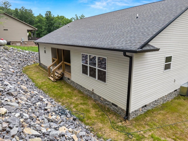 1523 Eads Bluff Rd NW, Georgetown, TN 37336 - view of property exterior featuring crawl space and roof with shingles