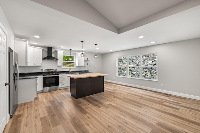 1523 Eads Bluff Rd NW, Georgetown, TN 37336 - kitchen featuring stainless steel appliances, wall chimney exhaust hood, recessed lighting, white cabinets, and tasteful backsplash