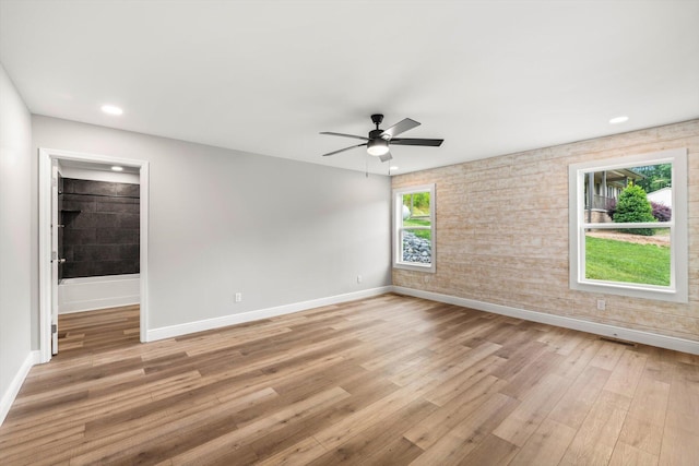 1523 Eads Bluff Rd NW, Georgetown, TN 37336 - empty room featuring light wood finished floors, ceiling fan, and recessed lighting