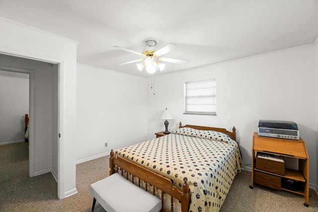 bedroom featuring ceiling fan and light carpet