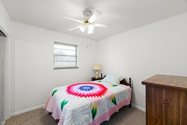 bedroom featuring carpet, ceiling fan, and crown molding