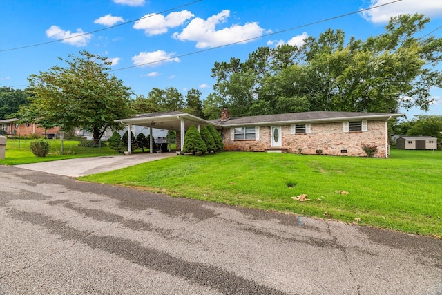 view of front of property with a carport and a front yard