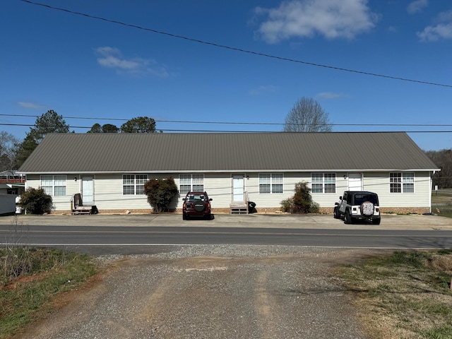 view of front of home featuring metal roof