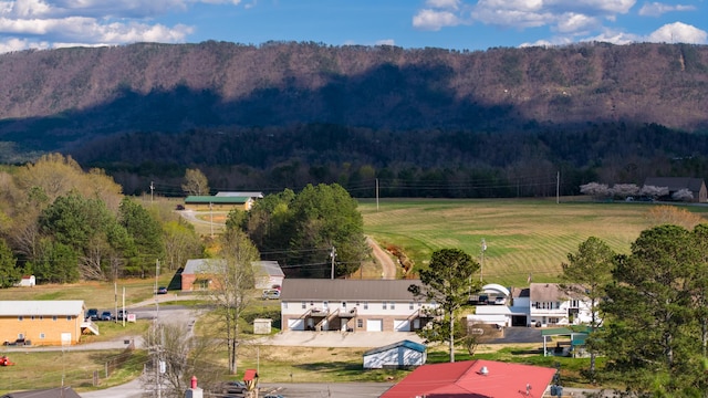 drone / aerial view featuring a forest view