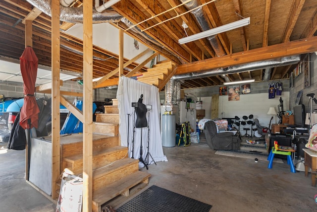 unfinished basement featuring stairway
