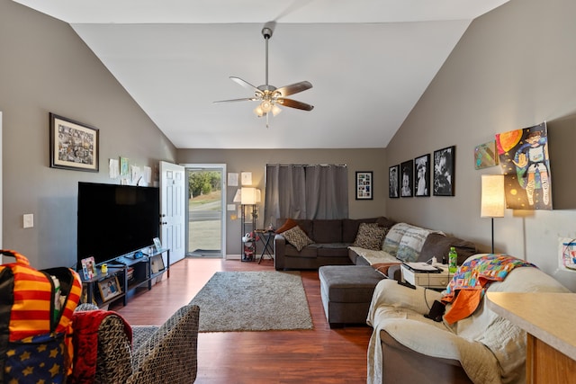 living room with lofted ceiling, wood finished floors, and a ceiling fan