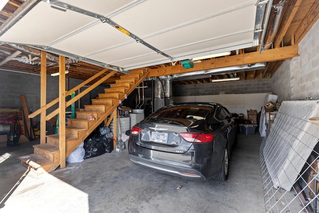 garage with concrete block wall