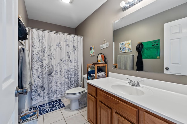 full bathroom featuring curtained shower, toilet, tile patterned flooring, and vanity