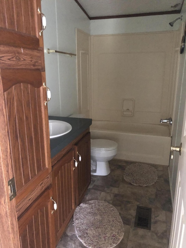 full bath with visible vents, tub / shower combination, toilet, ornamental molding, and vanity