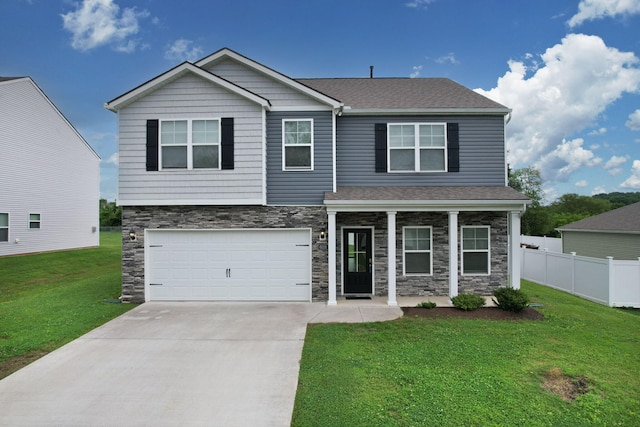 6026 Pearson Ln NW Unit 31, Cleveland, TN 37312 - view of front facade with stone siding, driveway, an attached garage, covered porch, and roof with shingles