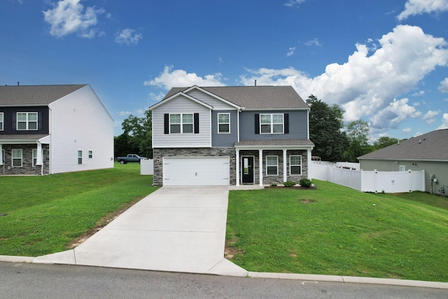 6026 Pearson Ln NW Unit 31, Cleveland, TN 37312 - view of front of home featuring stone siding, driveway, an attached garage, and a porch