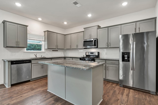 6026 Pearson Ln NW Unit 31, Cleveland, TN 37312 - kitchen with appliances with stainless steel finishes, gray cabinetry, stone countertops, a sink, and recessed lighting