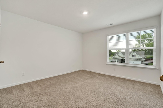 6026 Pearson Ln NW Unit 31, Cleveland, TN 37312 - spare room featuring carpet floors and baseboards