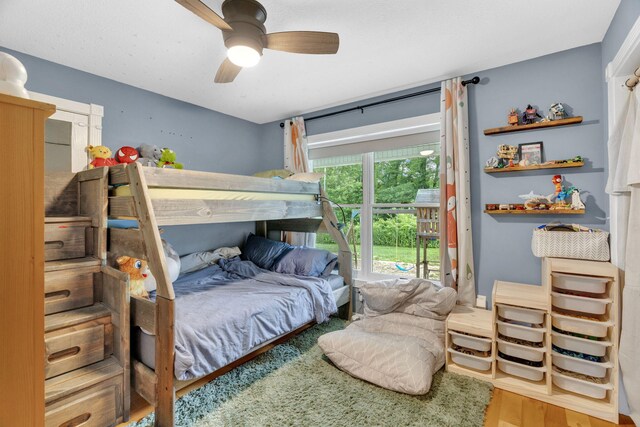 596 Clifty Creek Rd, Oakdale, TN 37829 - bedroom with access to outside, wood finished floors, and a ceiling fan