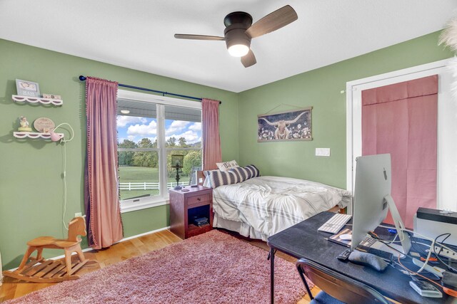 596 Clifty Creek Rd, Oakdale, TN 37829 - bedroom with wood finished floors, ceiling fan, and baseboards