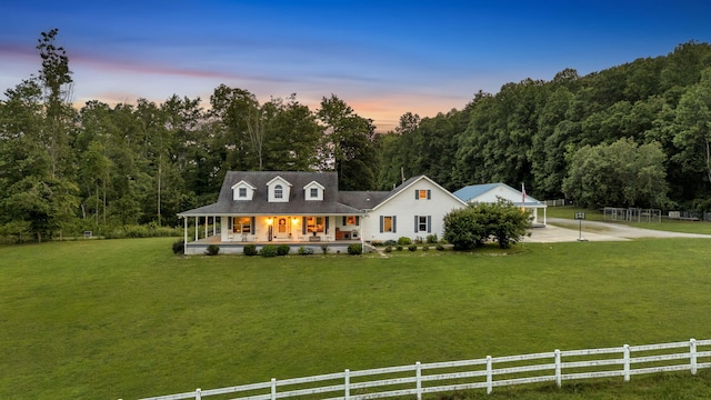596 Clifty Creek Rd, Oakdale, TN 37829 - view of front of house with covered porch, driveway, a forest view, and a carport