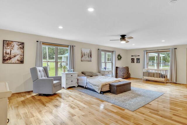 596 Clifty Creek Rd, Oakdale, TN 37829 - bedroom featuring multiple windows, light wood-style flooring, and recessed lighting