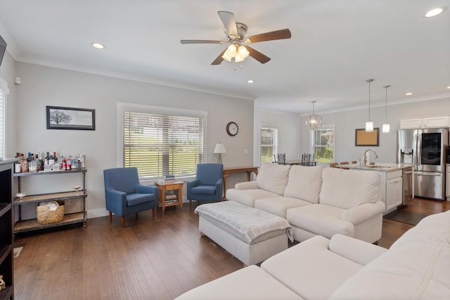 131 Winesap Way SW, Cleveland, TN 37311 - living area featuring healthy amount of natural light, ceiling fan, recessed lighting, dark wood-style flooring, and crown molding