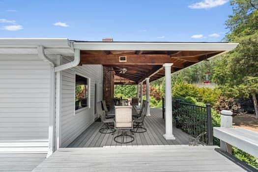 wooden terrace with ceiling fan