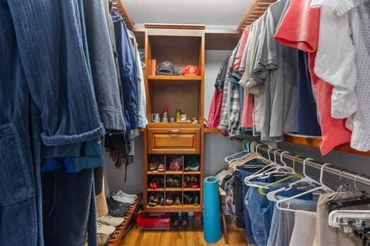 walk in closet featuring wood-type flooring