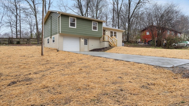 view of front of property with a garage