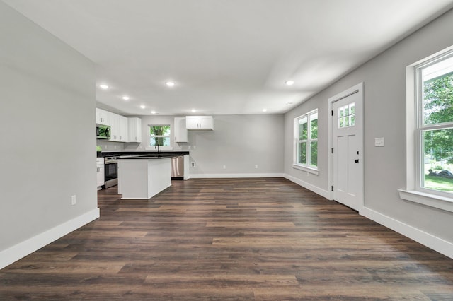 810 Cedar Springs Rd, Athens, TN 37303 - kitchen with stainless steel appliances, dark countertops, white cabinetry, recessed lighting, and baseboards