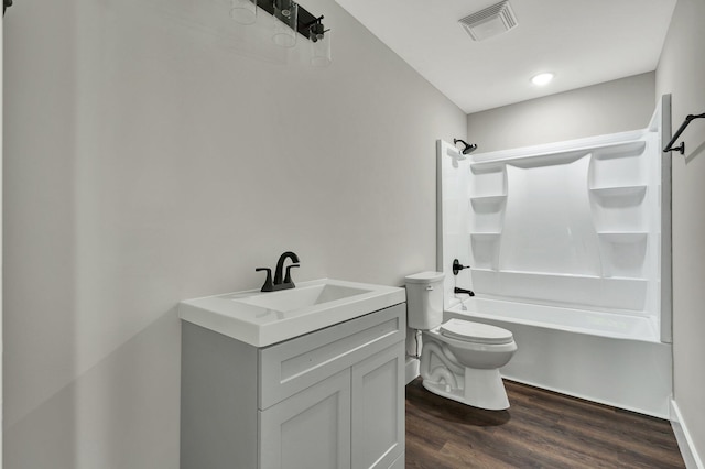 810 Cedar Springs Rd, Athens, TN 37303 - bathroom featuring toilet, shower / bathtub combination, wood finished floors, and vanity