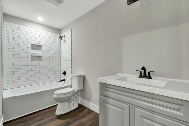 810 Cedar Springs Rd, Athens, TN 37303 - full bathroom with toilet, vanity, washtub / shower combination, wood finished floors, and baseboards