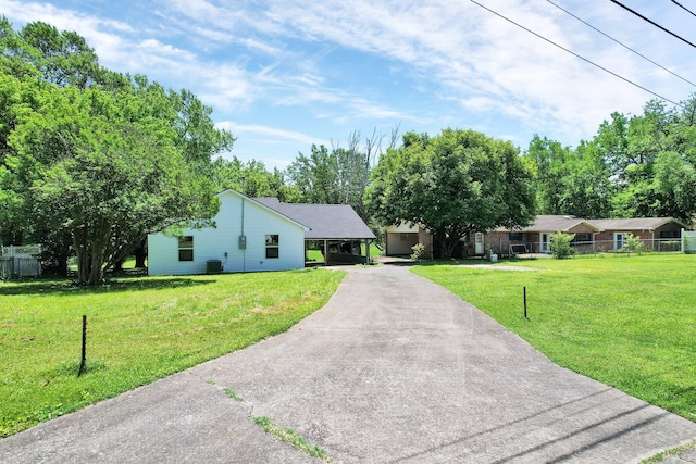 810 Cedar Springs Rd, Athens, TN 37303 - ranch-style house with asphalt driveway, a carport, and central AC
