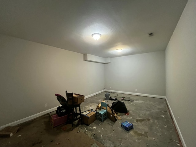 interior space featuring baseboards