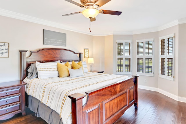 bedroom with dark hardwood / wood-style floors, ceiling fan, and ornamental molding