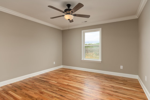 unfurnished room with light hardwood / wood-style flooring, ceiling fan, and ornamental molding