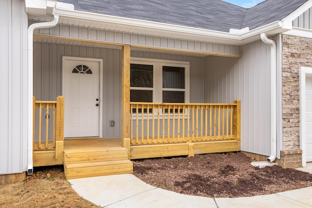 view of exterior entry featuring a porch