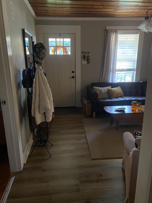 entryway with wooden ceiling, wood finished floors, and crown molding