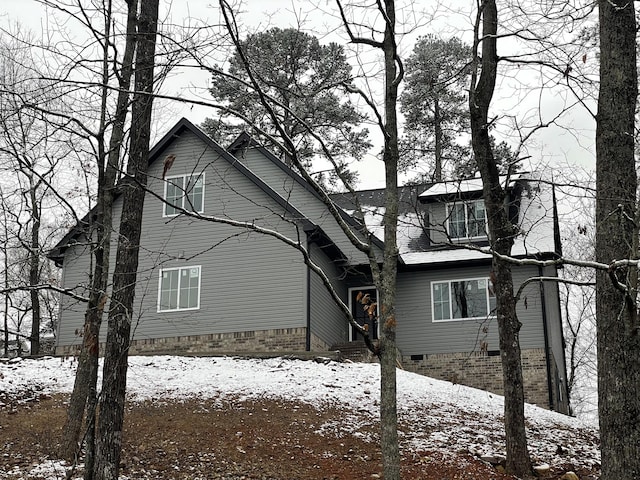 exterior space with crawl space