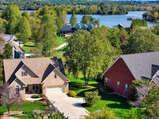 birds eye view of property featuring a water view