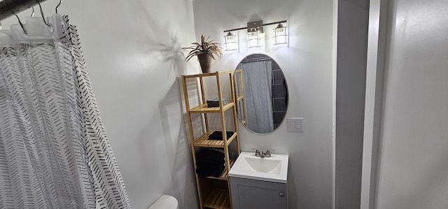 bathroom with vanity and walk in shower