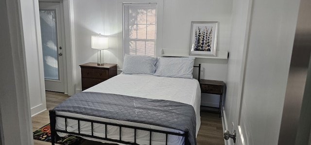 bedroom with wood-type flooring