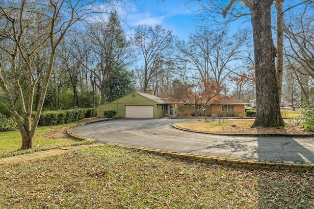 view of yard featuring a garage