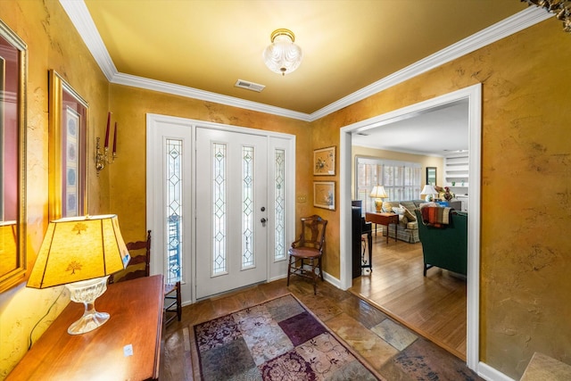 entryway featuring ornamental molding