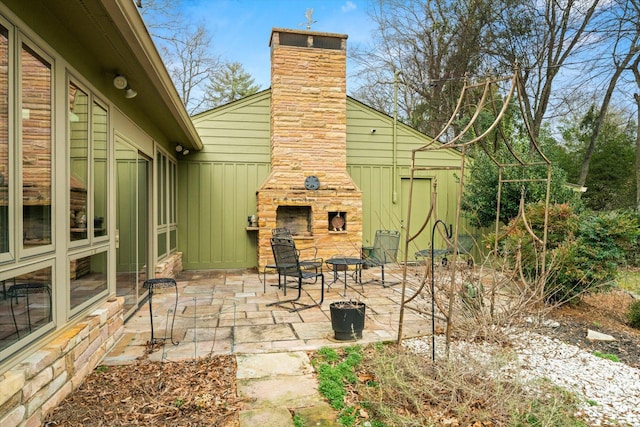 view of patio / terrace with a fireplace