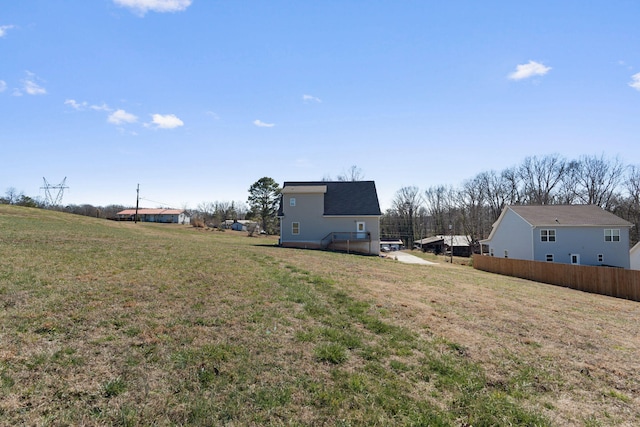 view of yard featuring fence