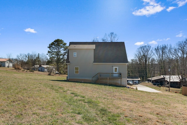 back of house with a yard