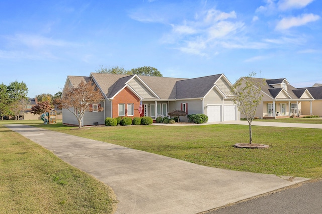 ranch-style house featuring a garage and a front lawn