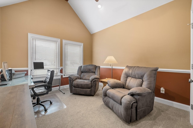 office space with carpet flooring and high vaulted ceiling