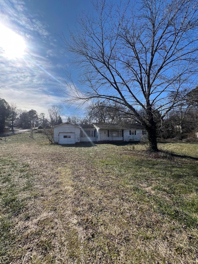 view of yard featuring a garage