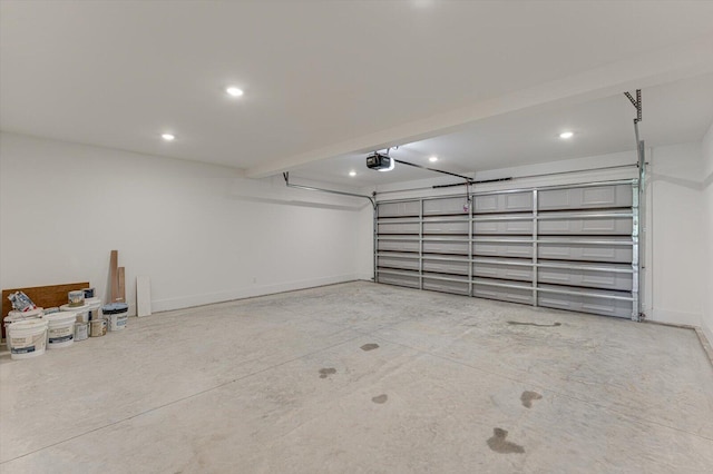111 Arthur Ln NW, Cleveland, TN 37312 - garage featuring a garage door opener, recessed lighting, and baseboards
