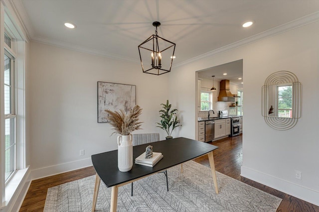 111 Arthur Ln NW, Cleveland, TN 37312 - office area with a sink, a chandelier, baseboards, ornamental molding, and dark wood-style flooring