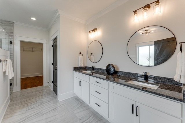111 Arthur Ln NW, Cleveland, TN 37312 - bathroom with a spacious closet, ornamental molding, a stall shower, double vanity, and baseboards